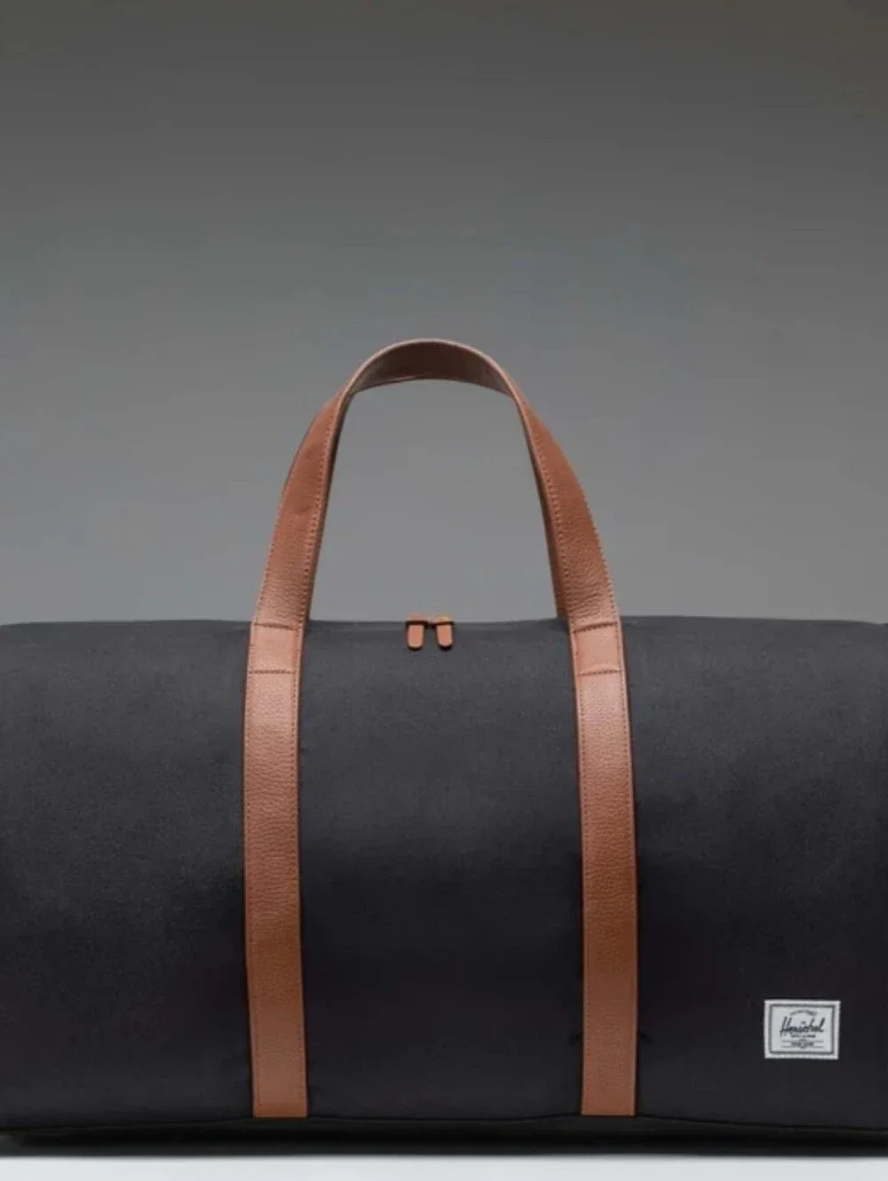 Herschel Supply Co Novel Black Duffel Bag with Brown Leather Handles